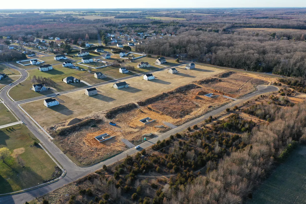The Reserve at Button Mill in Upper Deerfield Township at golden hour, from the air