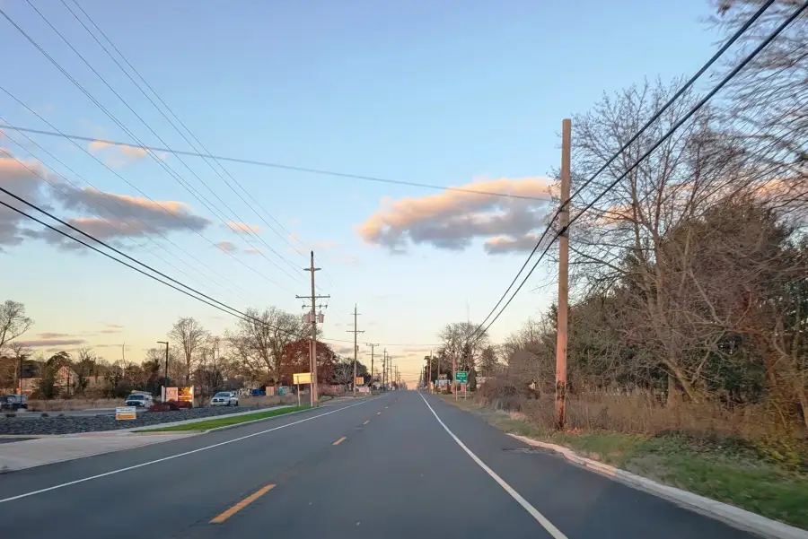 Northbound US Route 9 entering Marmora in Upper Township at sunset